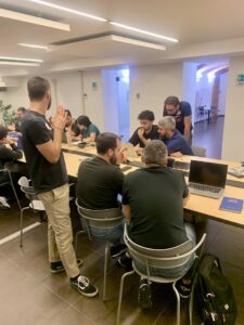 Classroom full with people working on pc